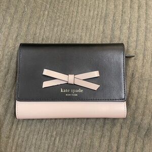 Kate Spade black and nude bow wallet